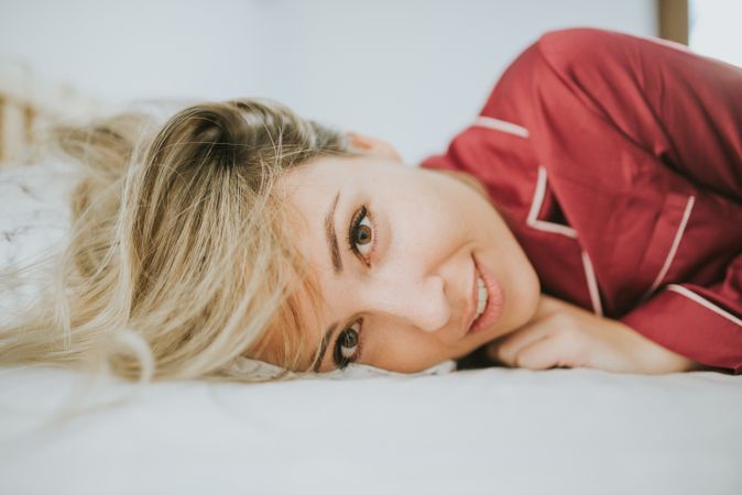 Woman and smiling in bed