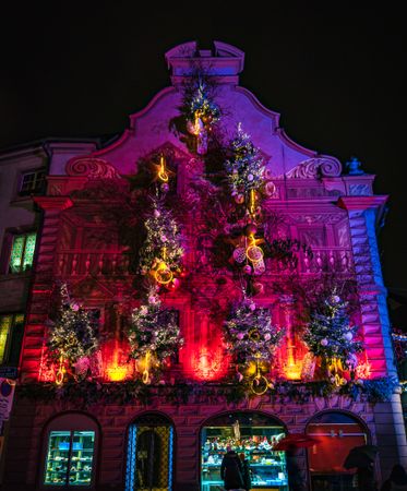 Facade of building in Strasbourg with beautiful Christmas lights