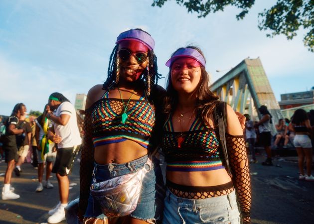London, England, United Kingdom - August 27, 2022: Two females on sunny day at Notting Hill Carnival