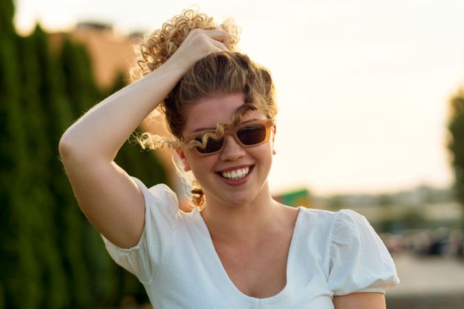 Portrait curly haired female outdoors