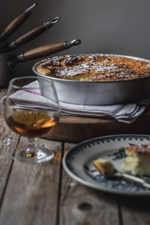 Cottage cheese pudding and glass of cognac