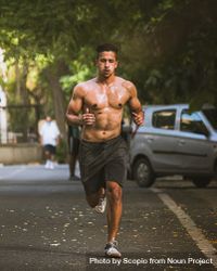 Man jogging on street bE87N4