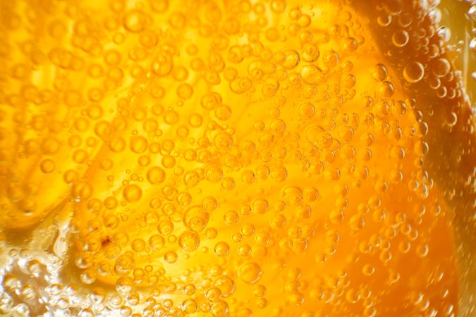 Orange in tasty alcoholic beverage