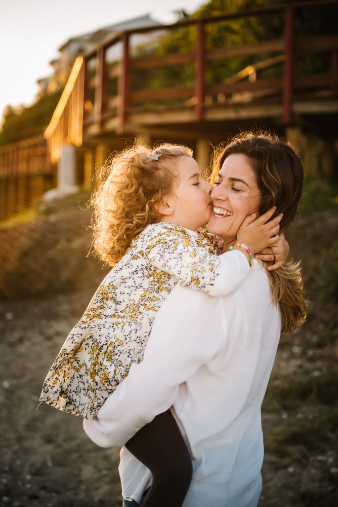 Mother with her daughter at beach