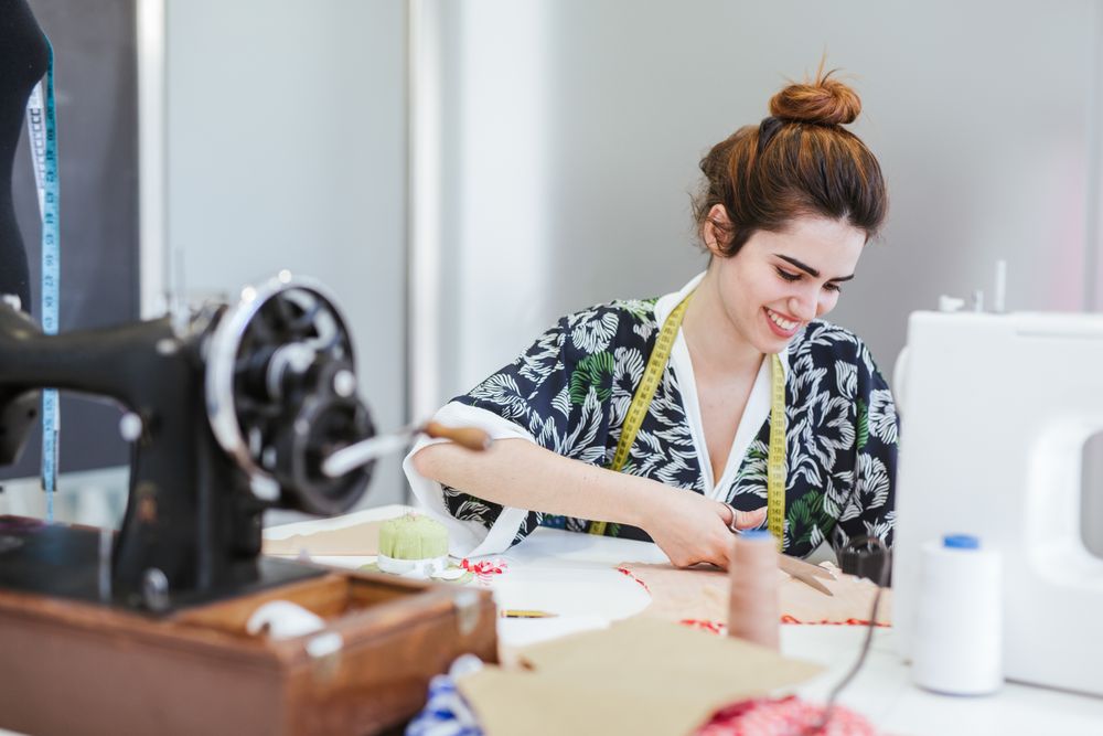 Woman in a sewing school