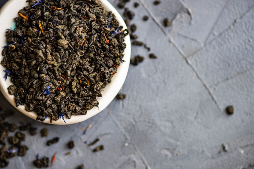 Loose leaf green tea in a bowl