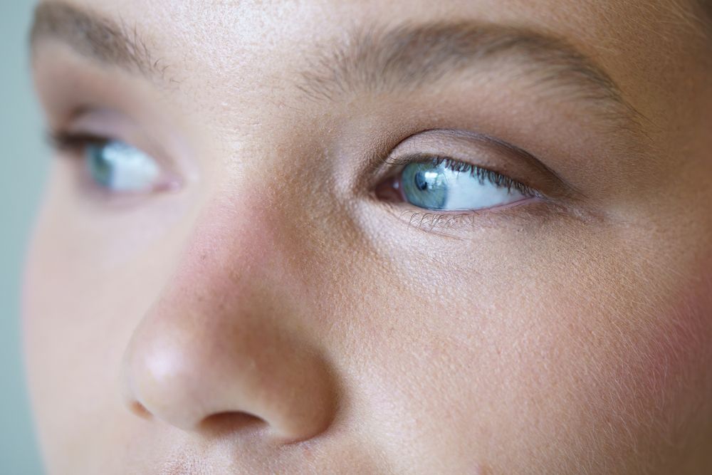 Close-up of the blue eyes of a white woman