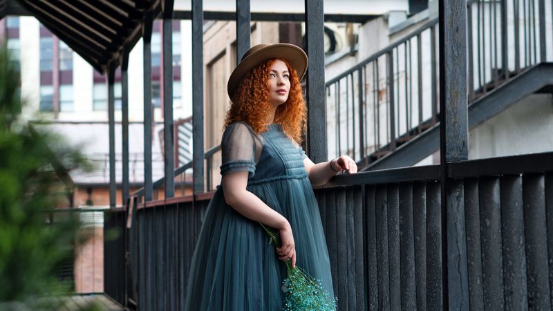 Street portrait of female in hat
