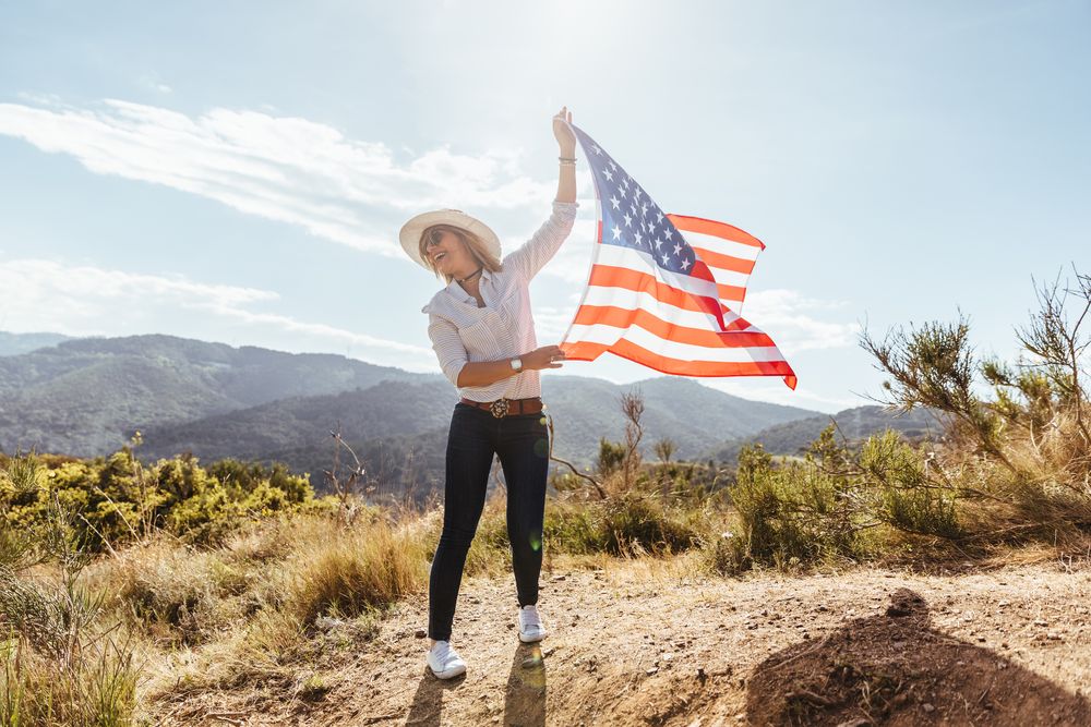 Young woman with an American flag