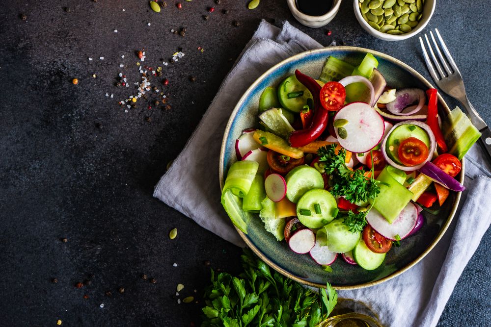 Delicious raw salad with freshly chopped vegetables