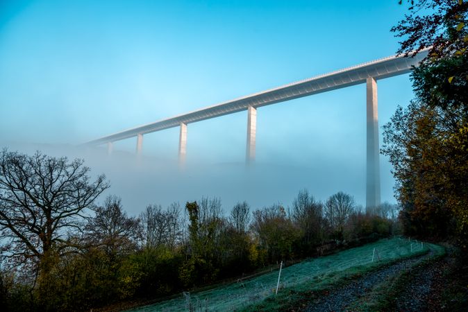 Majestic bridge over dense fog, low angle view, in Braunsbach, Germany