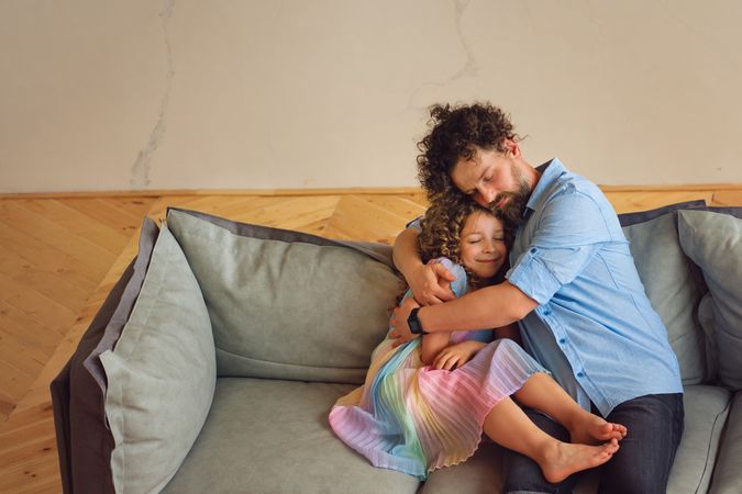 Dad and daughter at home