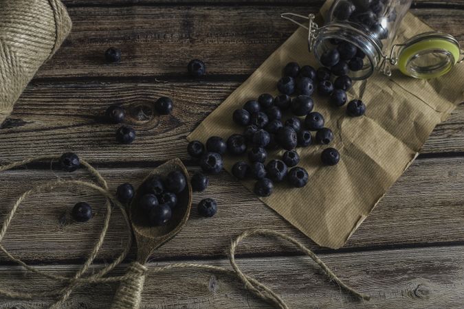 Tasty bilberry on wooden surface