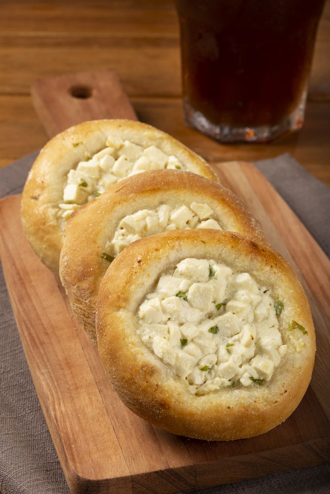 Arabic cheese sfiha on the table.