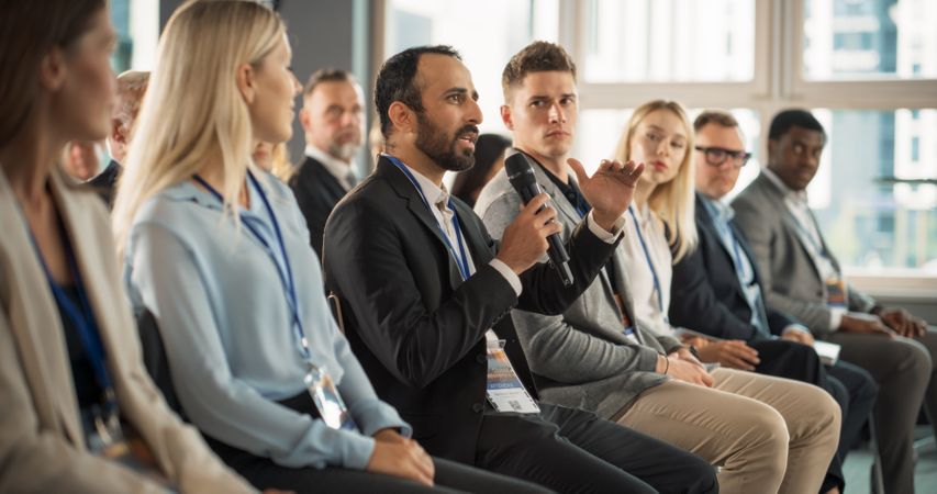 Middle Eastern Man At International Tech Forum.