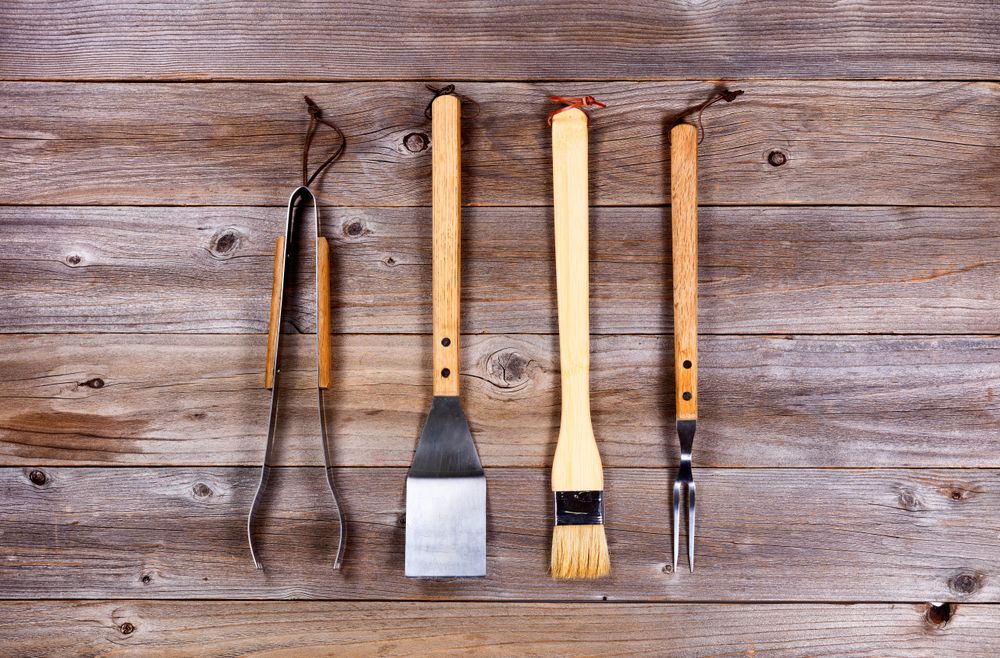 Used utensils for barbecue cooking
