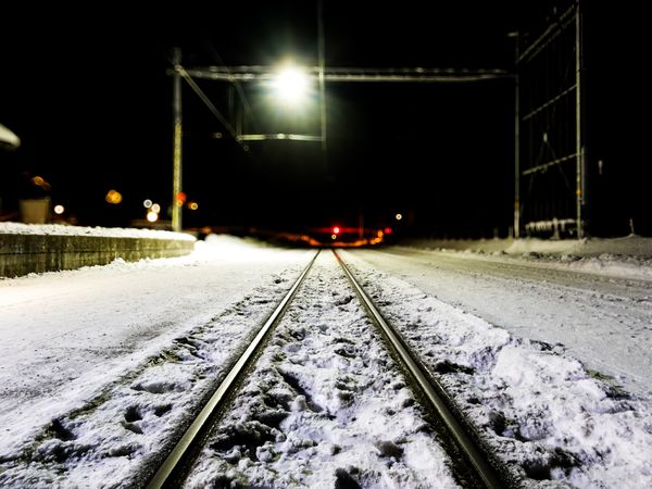 Snowy train tracks at dawn, Rougemont