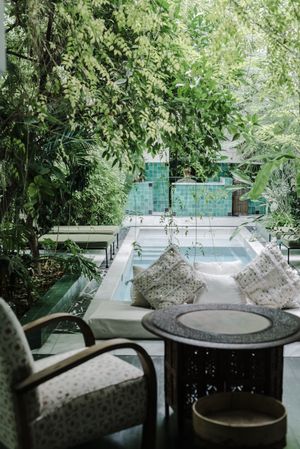 Soft bench near pool in garden