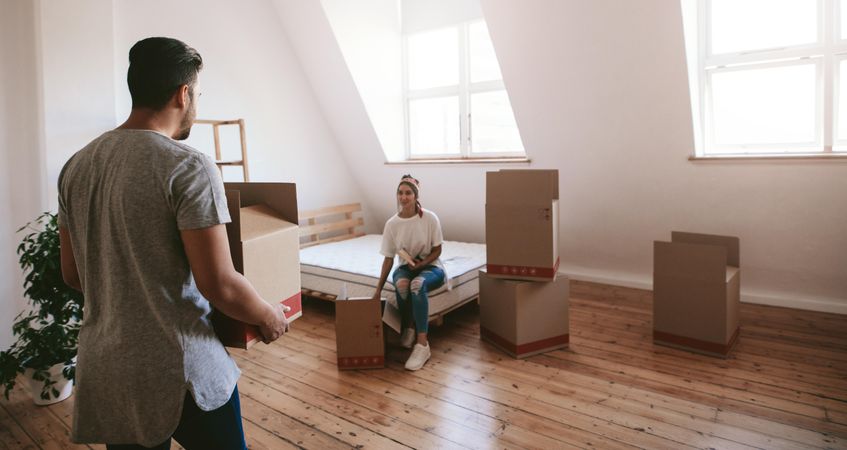 Young couple moving into new home together