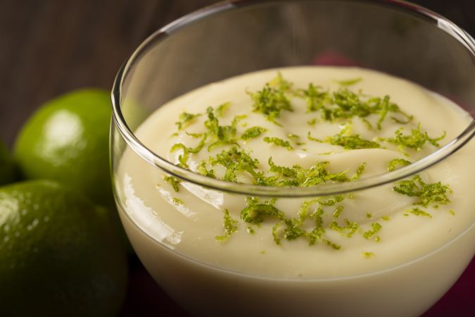 Lemon mousse with lemon zest on top.