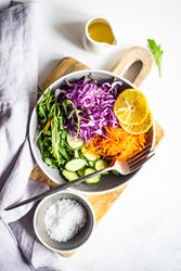 Top view of healthy salad bowl with red cabbage