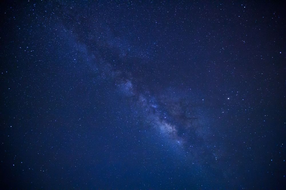 milky way galaxy and space dust in the universe, Long exposure photograph, with grain.