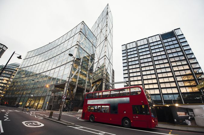 Red bus on city street
