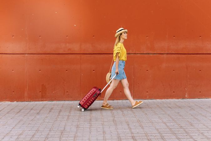 Young woman traveler going on holiday