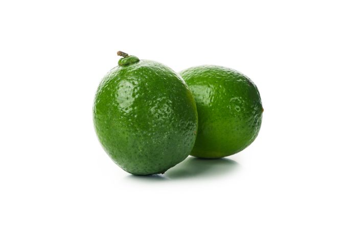 Fresh green avocado isolated on blank background