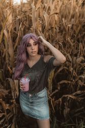 Casual woman in dry vegetation
