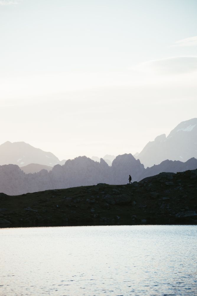 Majestic mountain landscape with human silhouette