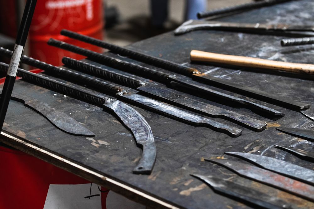 Different metal sharp tools at workbench