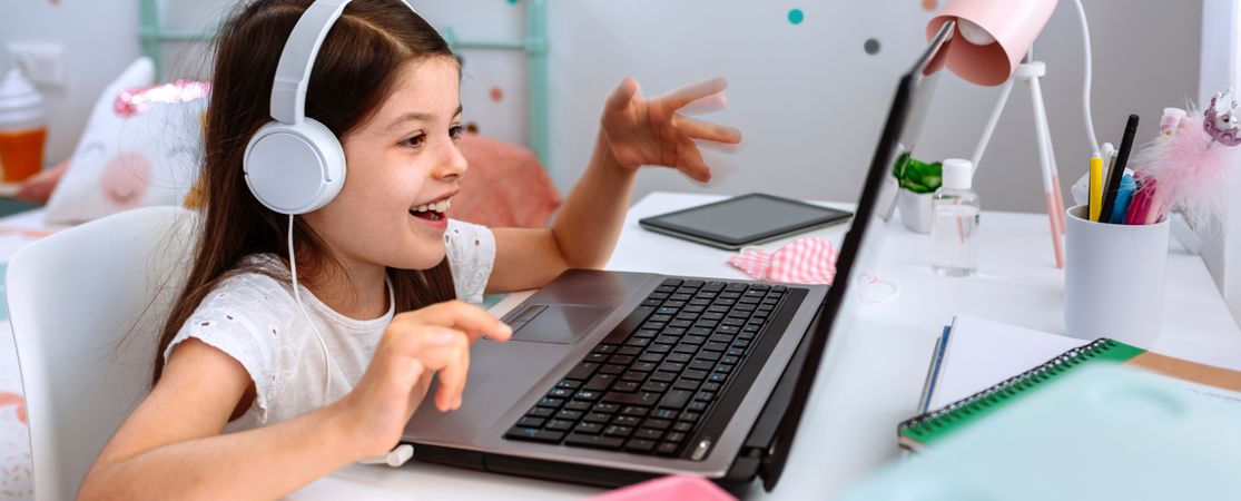 Girl studying from home with laptop