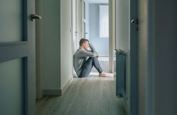 Man sitting on the floor