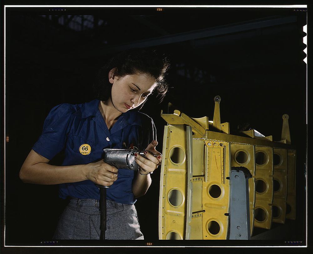 Nashville, TN, USA - 1943: Woman operating a hand drill