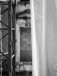 Builder's curtain partially covering window of Villa's facade on Blvd d'Italie, Monaco
