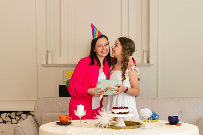 Birthday girl ishares moment with mother