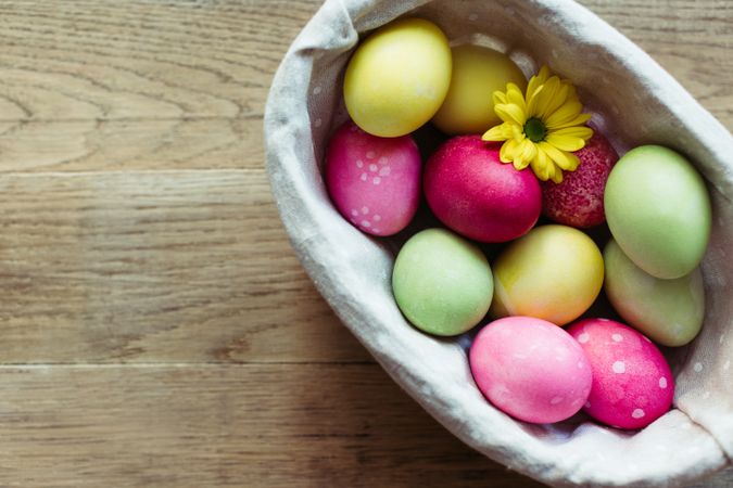 Flowers and Easter eggs on table