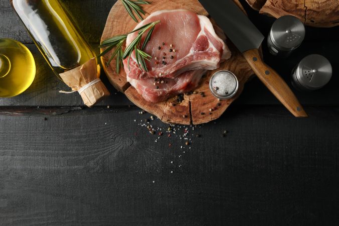 Composition with raw meat and ingredients. Cooking steak concept