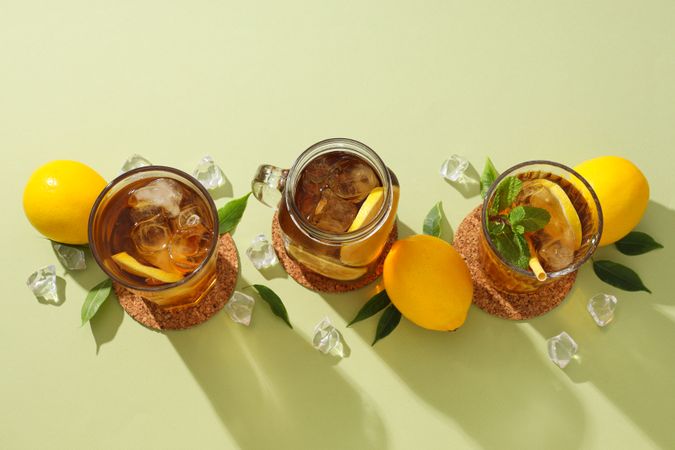 Cold tea with ice, mint leaves and orange slices