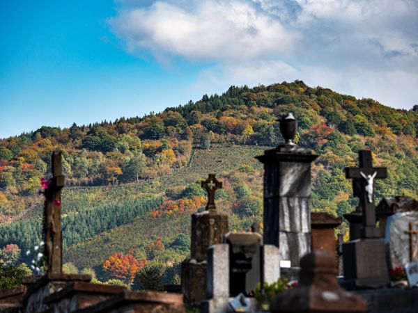 Old rickety stone monuments in the cemetery.