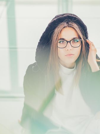 Young woman over a glasses ground
