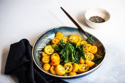 Fresh kumquat salad in bowl