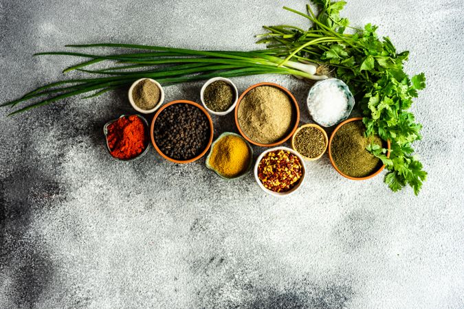 Top view of colorful Georgian spices in bowls