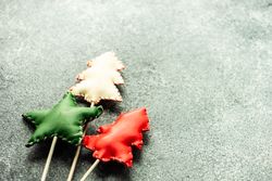 Three felt Christmas decorations on grey counter