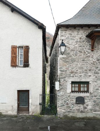 Old buildings in city near mountains