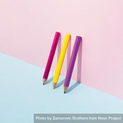 School pencils leaning on pastel background 4dqllb