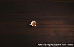 Single espresso shot pictured on wooden table 43eDZ0