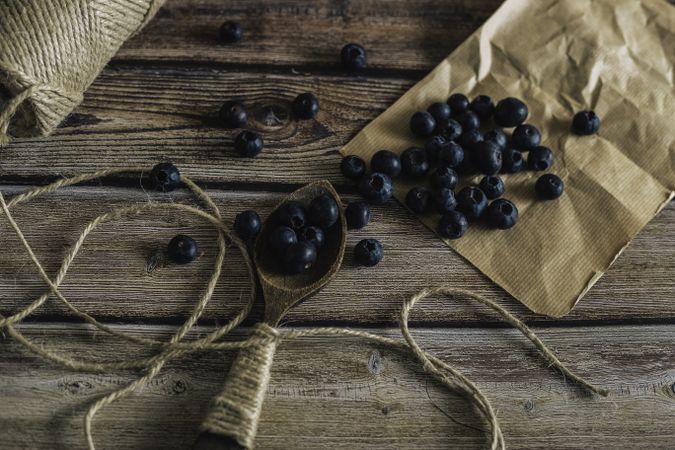 Tasty bilberry on wooden surface