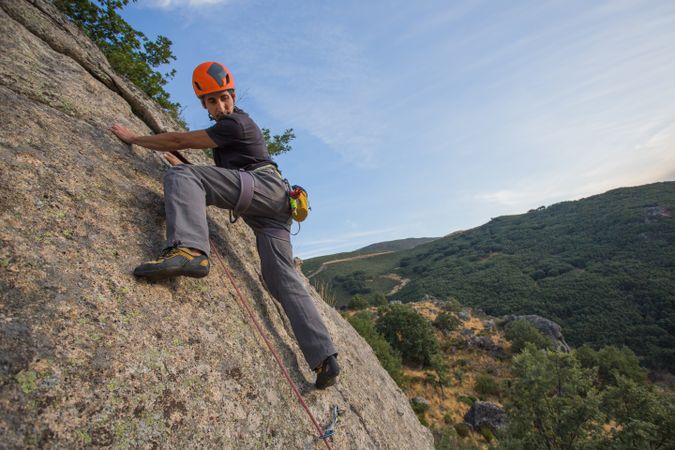 Man climbing a rock
